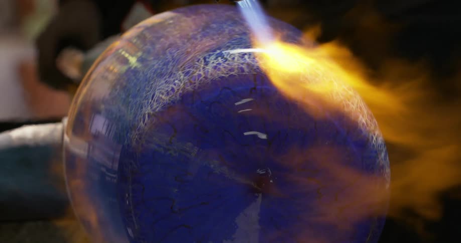 Ceramic vase rotating with flames heating it