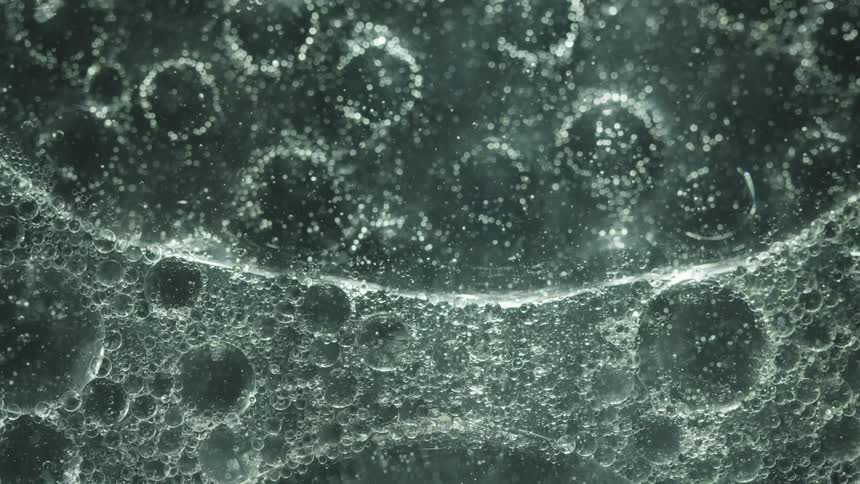 Transparent liquid with small bubbles
