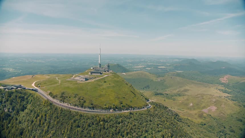 A castle is at the top of the hill