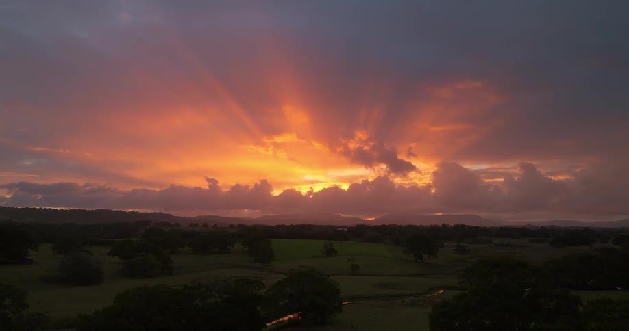 The sun is setting on the landscape
