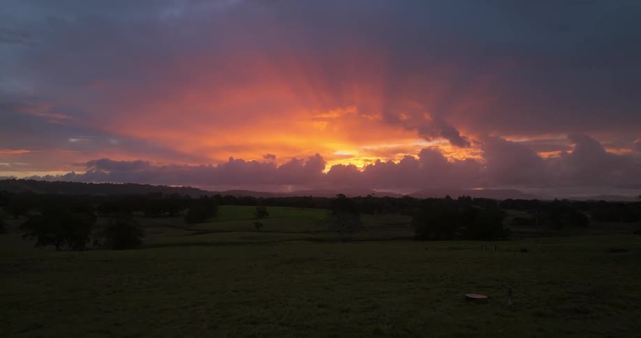 The sun is rising on the landscape