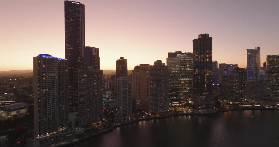 Aerial of metropolitan city with skyscraper and lake