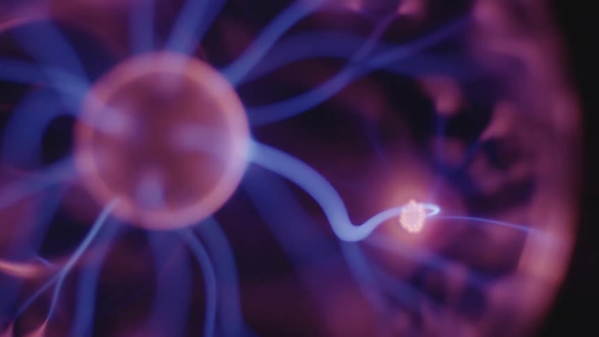 Colorful energy beams inside a plasma globe