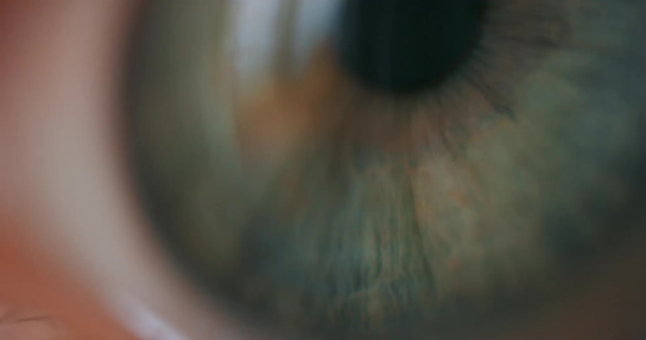 A person blinks their eye