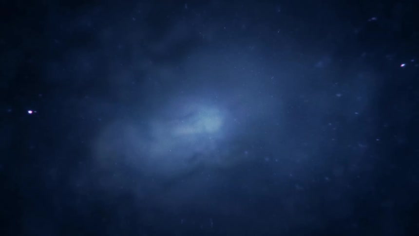 An endless blue expanse of the universe illuminated by a galaxy in the disctance