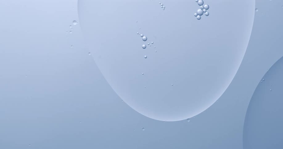 Large bubbles merge and morph while floating on blue fluid