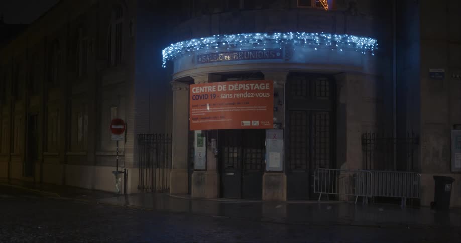 A big sign is on the front of the building