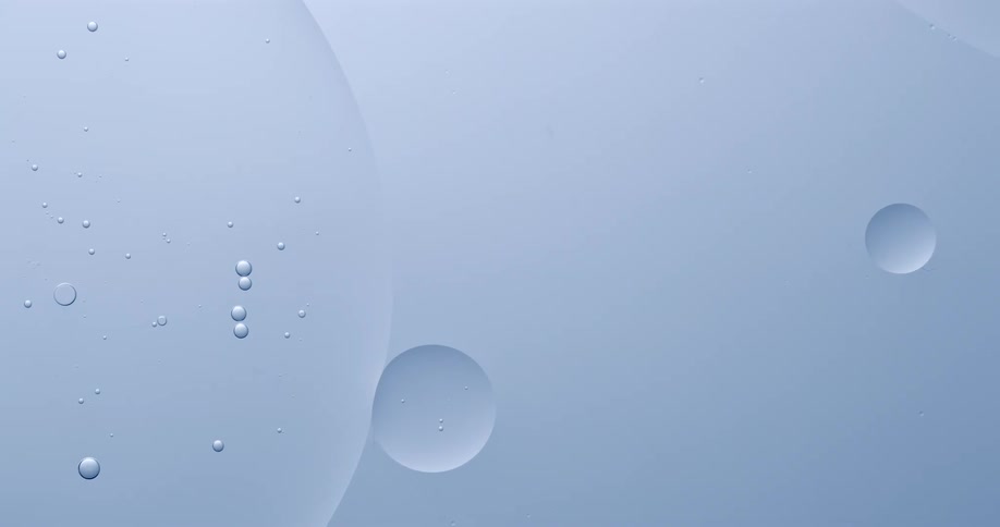Large air bubbles float over a teal pastel background