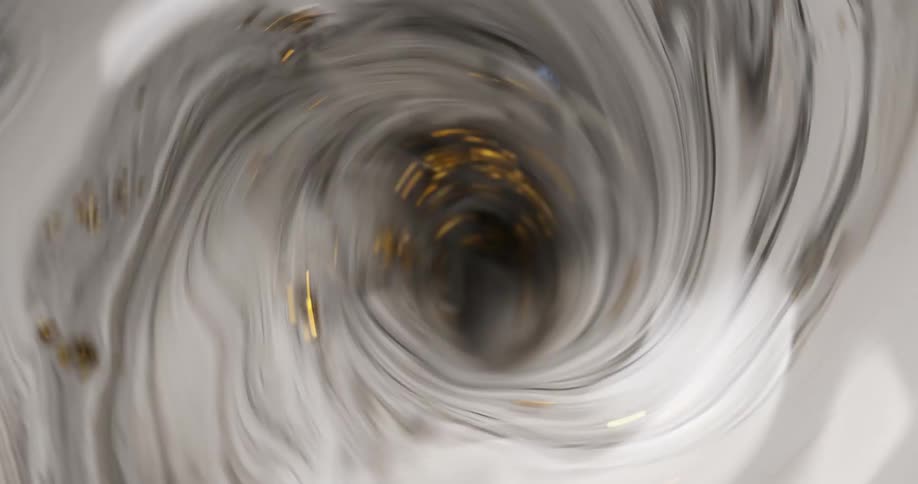 The gold mixes around in a swirl