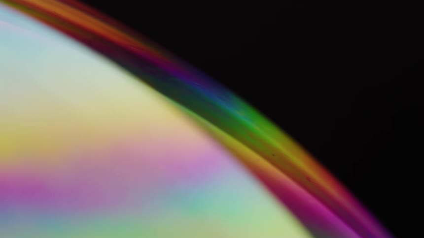 A planet like sphere filled with rainbow colors