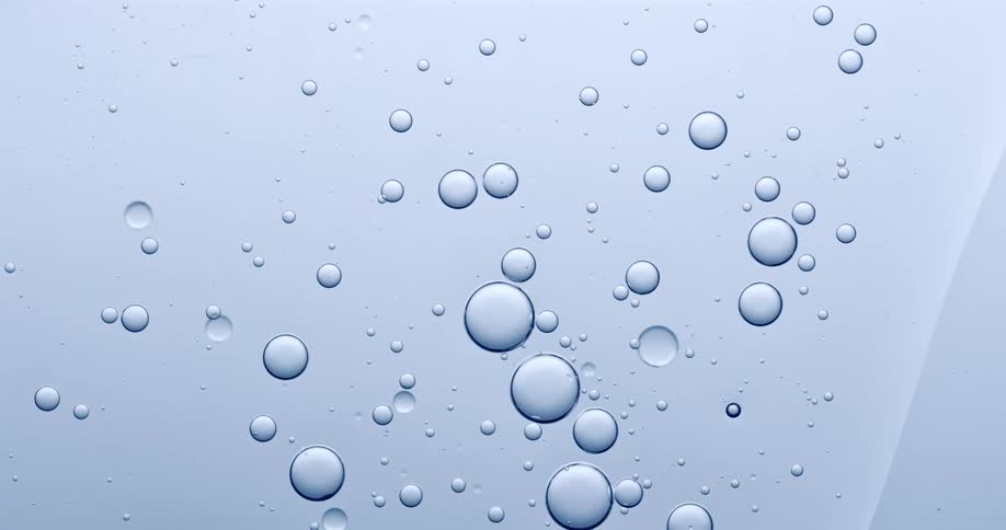 Many smaller bubbles inside a large orb are floating and moving
