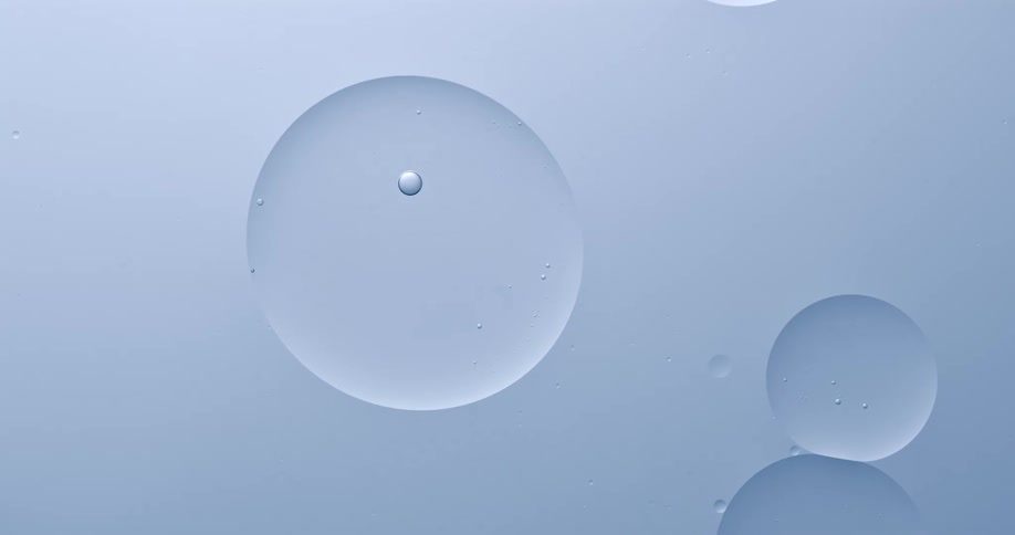 Large air bubbles float over a teal pastel background