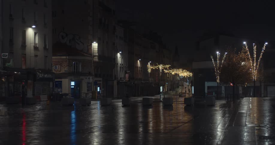 The town square is empty at night