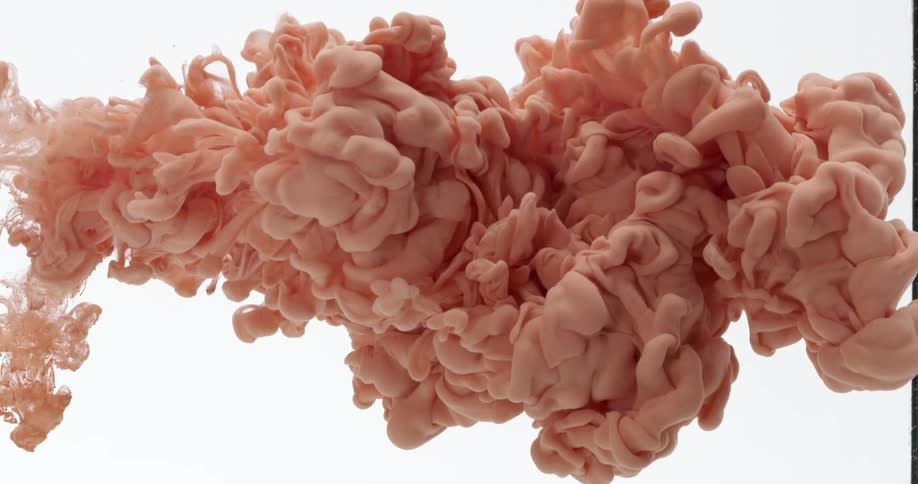 Orange liquid flows in transparent fluid
