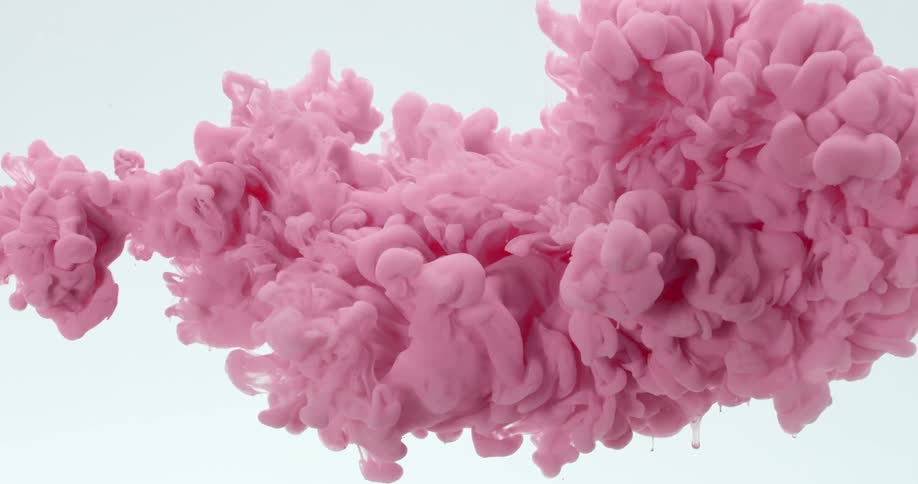 Pink dye expands while flowing through water