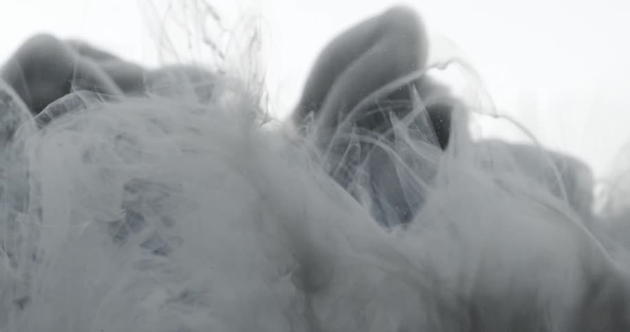 A cloud of gray smoke on the white landscape