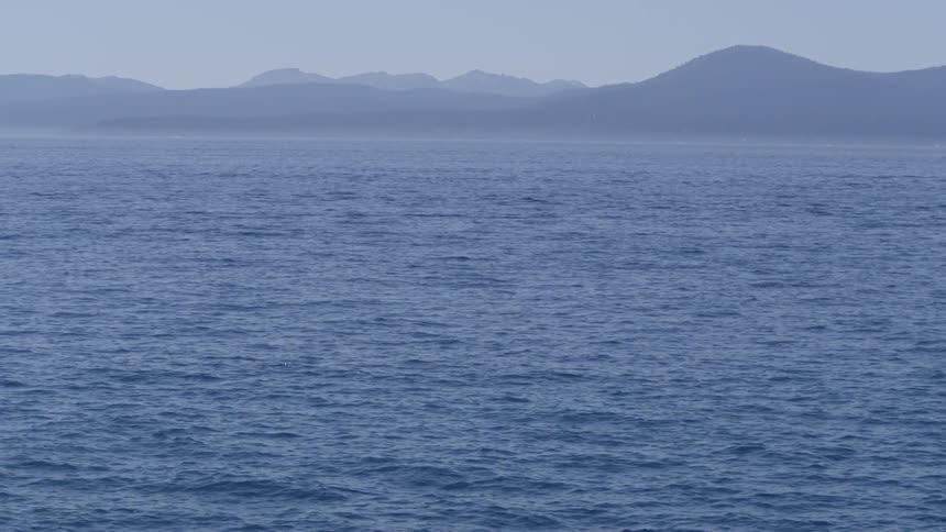 The water below is rough on a cloudy day