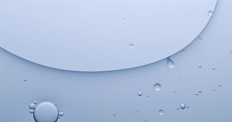 Abstract shot of fluid motion of water and bubbles