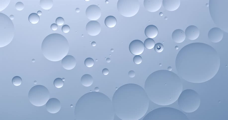 Bubbles expanding in an abstract liquid texture