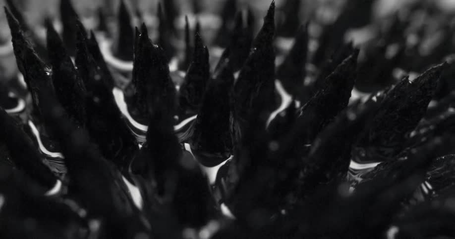 Sharp stakes in a black liquid