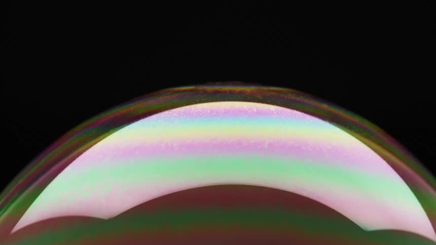 A rainbow color in a dark background