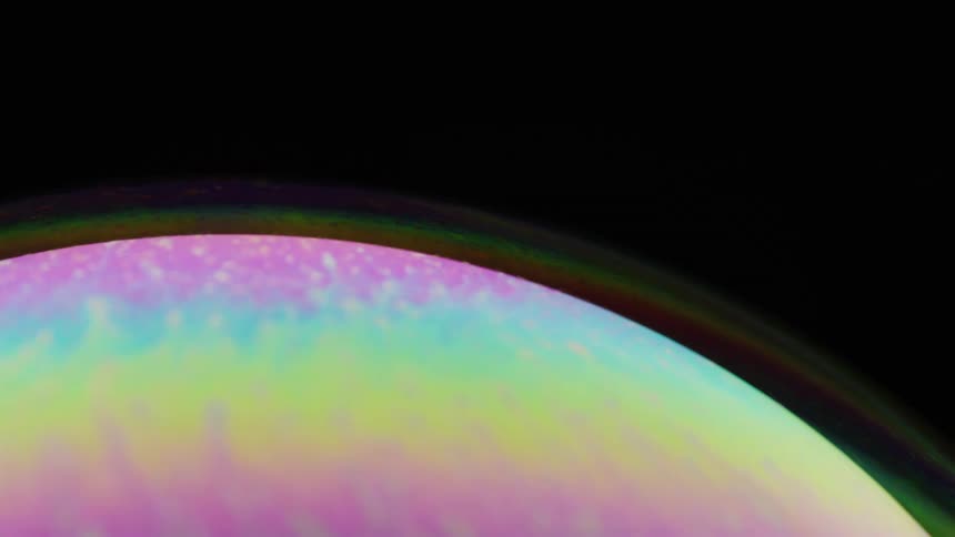 Yellow pink blue sphere spinning