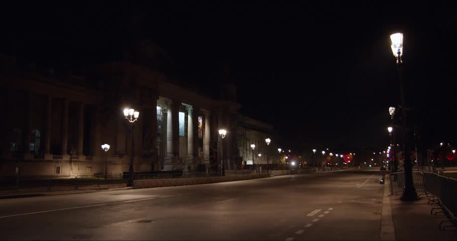 The street in the city is empty at night