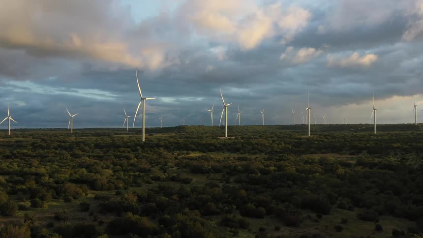 Windmills are lined on the landscape