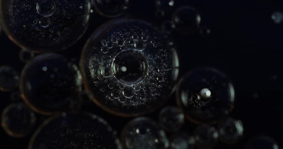 Circles of transparent liquid with bubbles