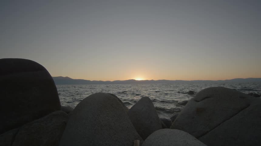 Large rocks lead to rough waters at dawn