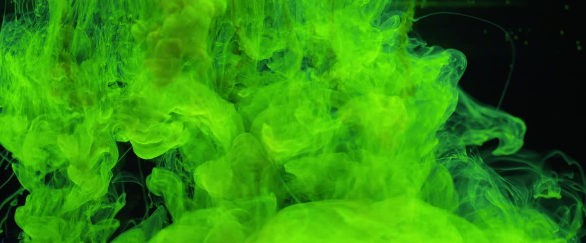 A room filled with green hued smoke