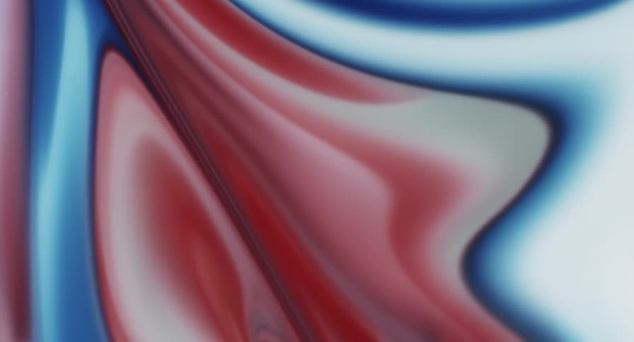 A red blue and white gelatinous liquid moving