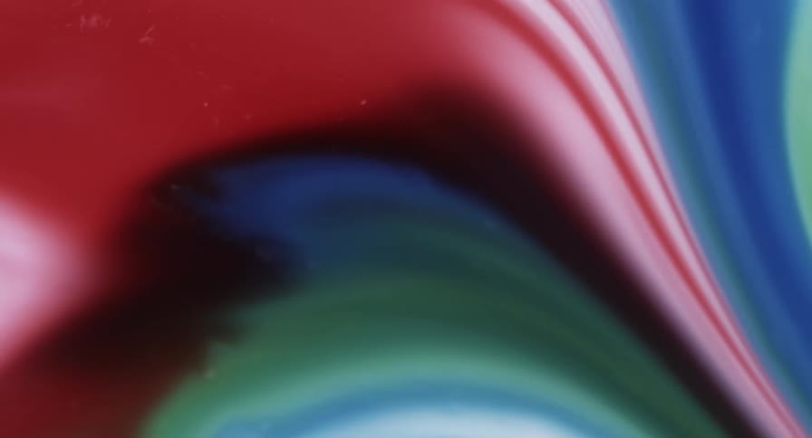 Abstract red blue and yellow paints flow