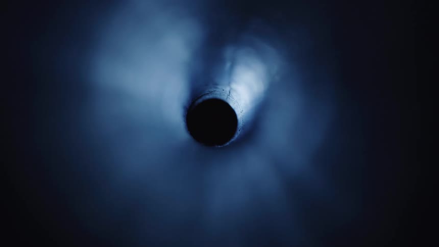 Light passing under an abstract cylindrical shape with shadows