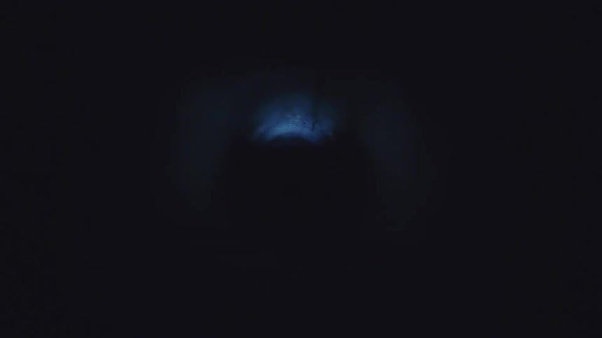 Light illuminating an abstract and shadowy cylinder