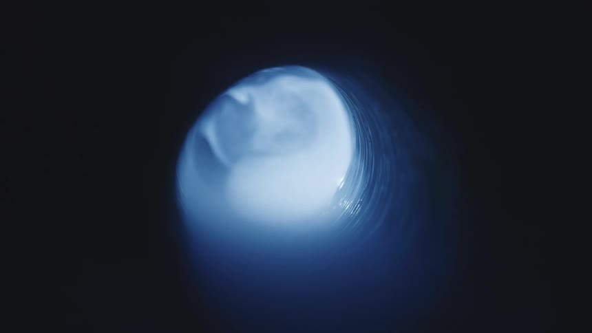 Smoke inside a small abstract cylinder