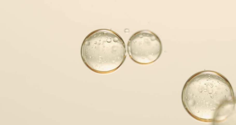 Abstract water bubbles falling in slow motion