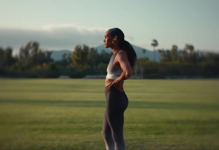 Athlete standing in a field