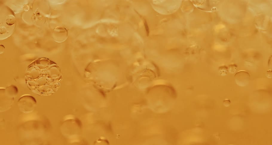 Dense bubbles in microscopic orange liquid in motion