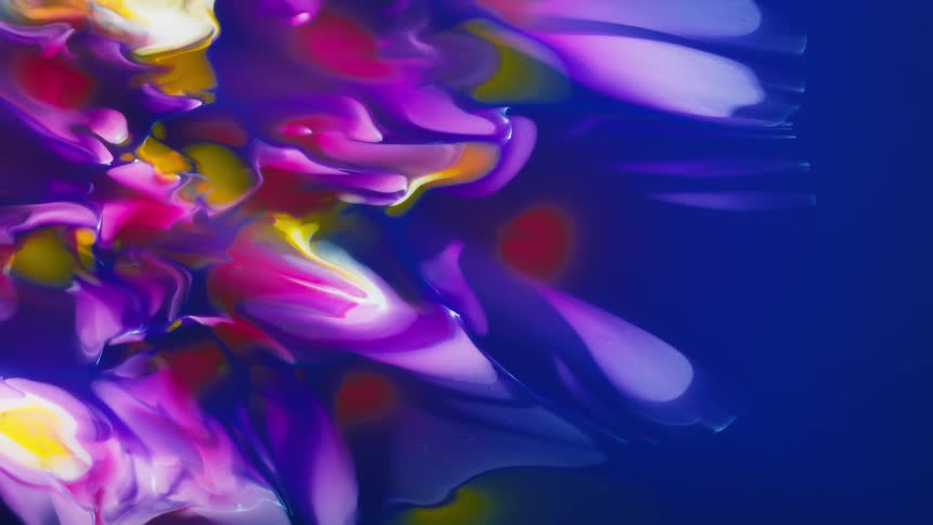 Pink blue orange and white paint slowly moving across a blue canvas smoothly