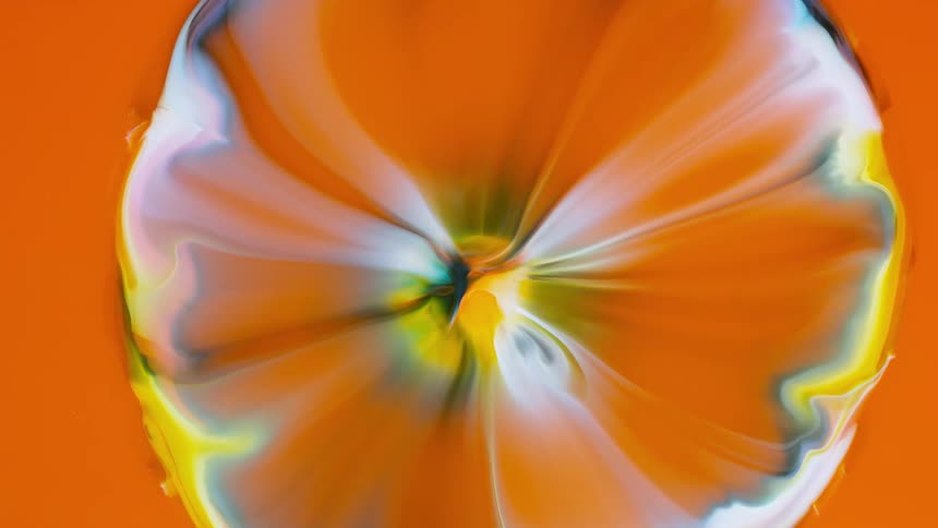 Dense and abstract liquid in special effects in orange yellow and white