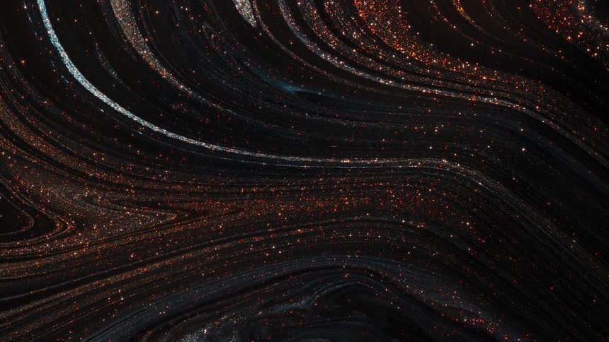 Pink and gold glitter lines swirled around slowly on a black canvas