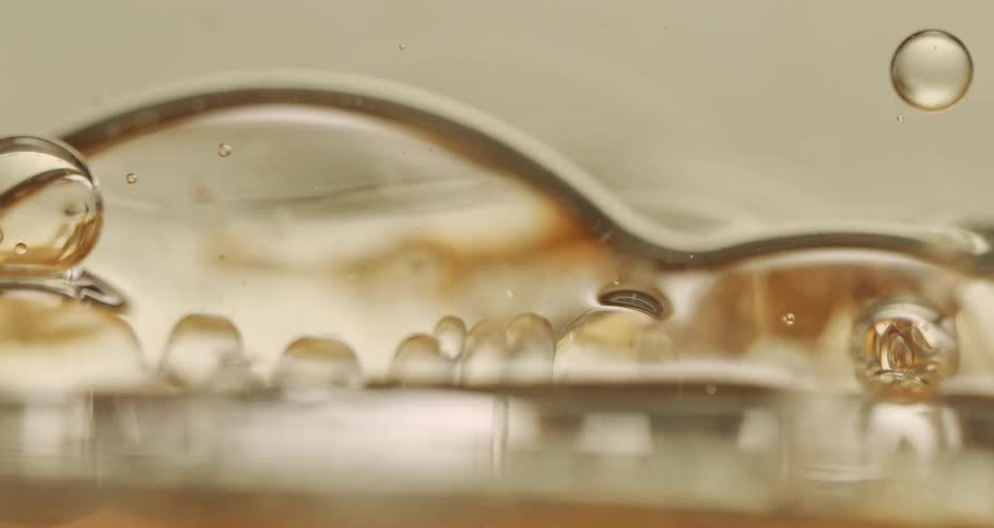 Extreme closeup of abstract dense liquid bubbles in motion