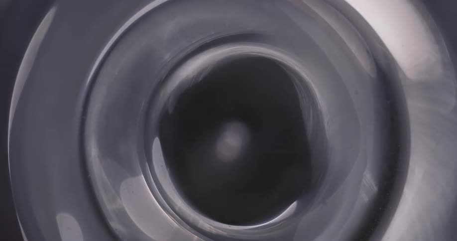 Reflection of light flares against a black background