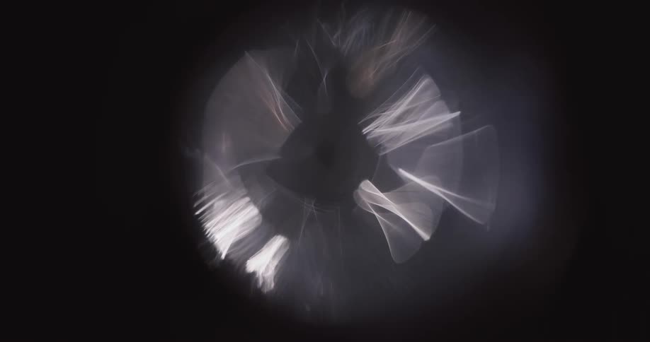 Fractal of lights in abstract reflection on a black background