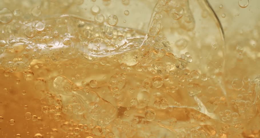 Dense and abstract liquid in motion with bubbles