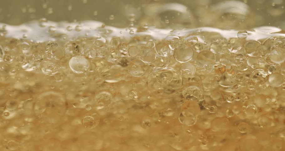 Floating golden liquid bobbles