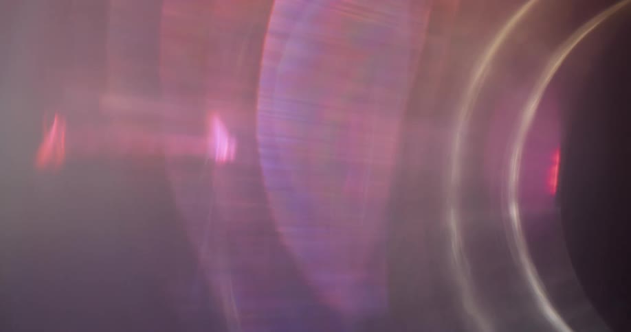 Black background with abstract lens flare lights