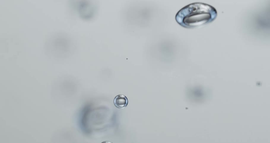 A slow motion floating liquid bobbles