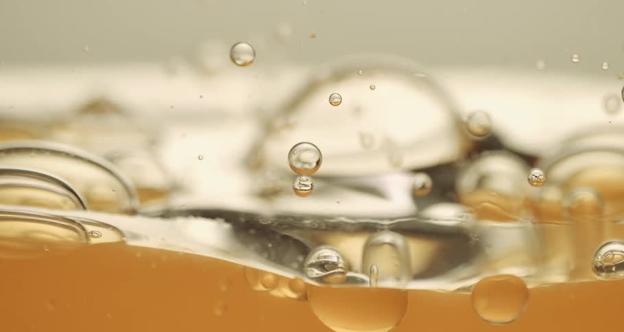 Abstract dense liquid with slowly moving bubbles